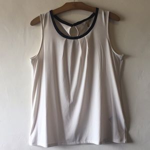 Scoop neck white tank.